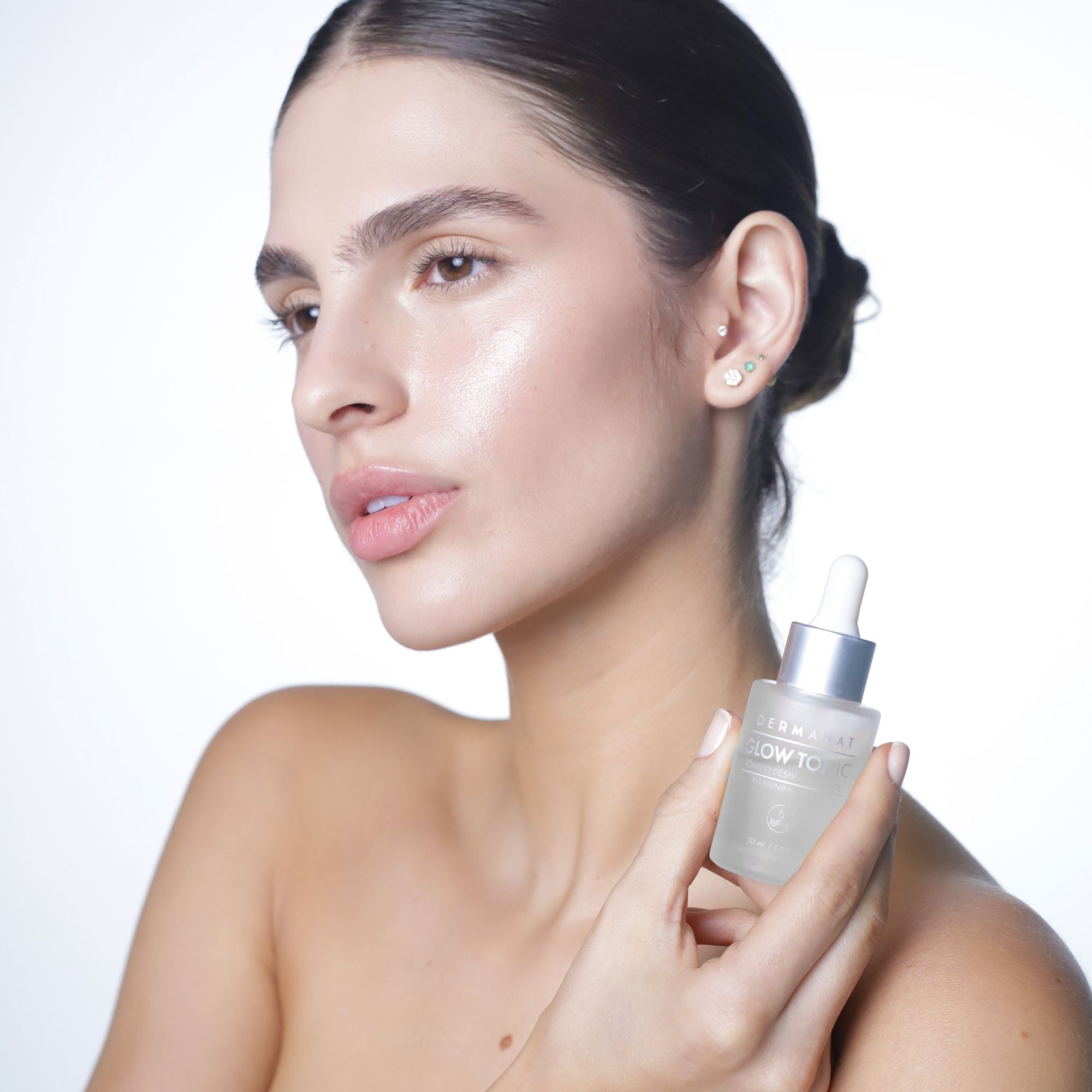 Glow Tonic Tónico despigmentante que unifica el tono, aclara, ilumina y mejora la textura de la piel Dermanat